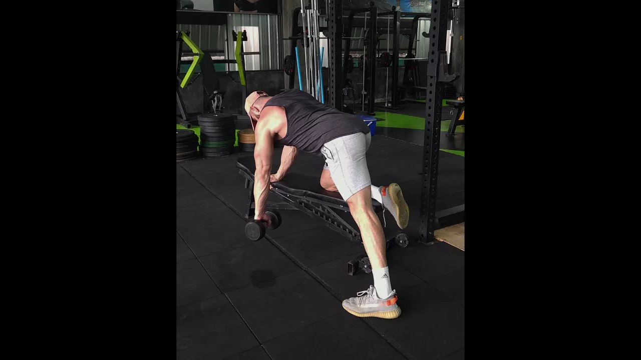 Bench Supported Dumbbell Rear Delt Row Single Arm exercise