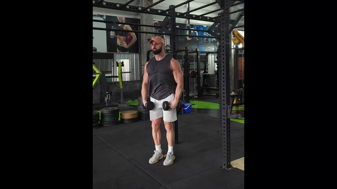 Standing Dumbbell Lateral Raise exercise